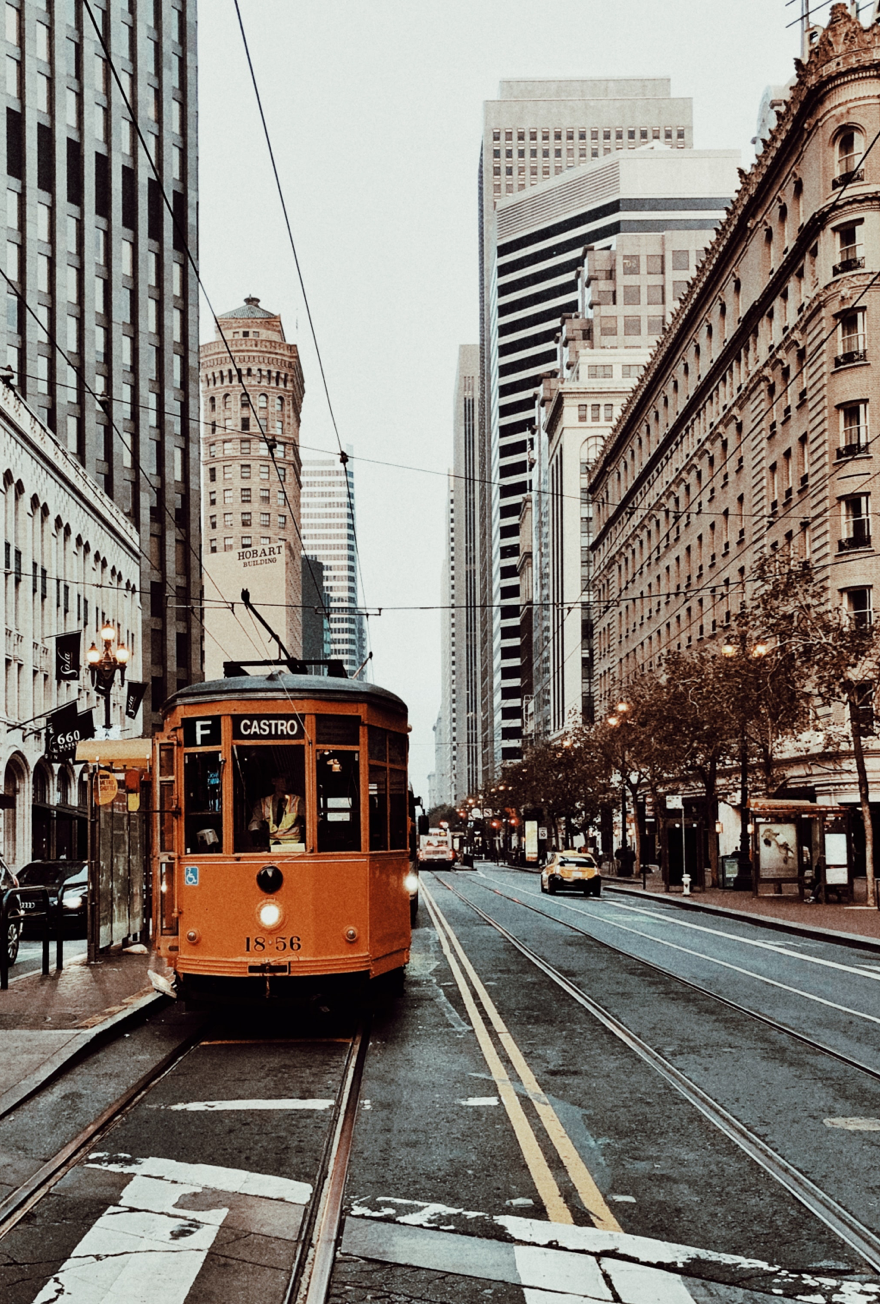A trolley car on a street in San Francisco.