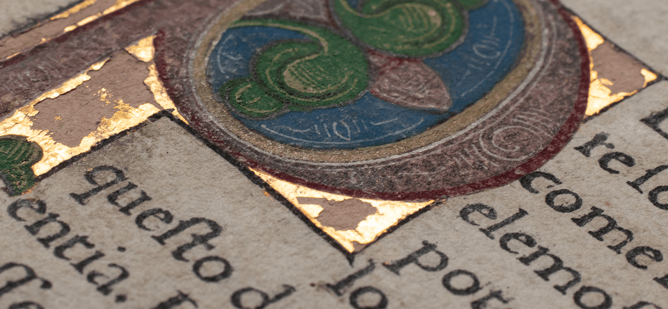 A swirling pattern from the inside cover of a medieval text